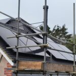Scaffolding and panels on roof